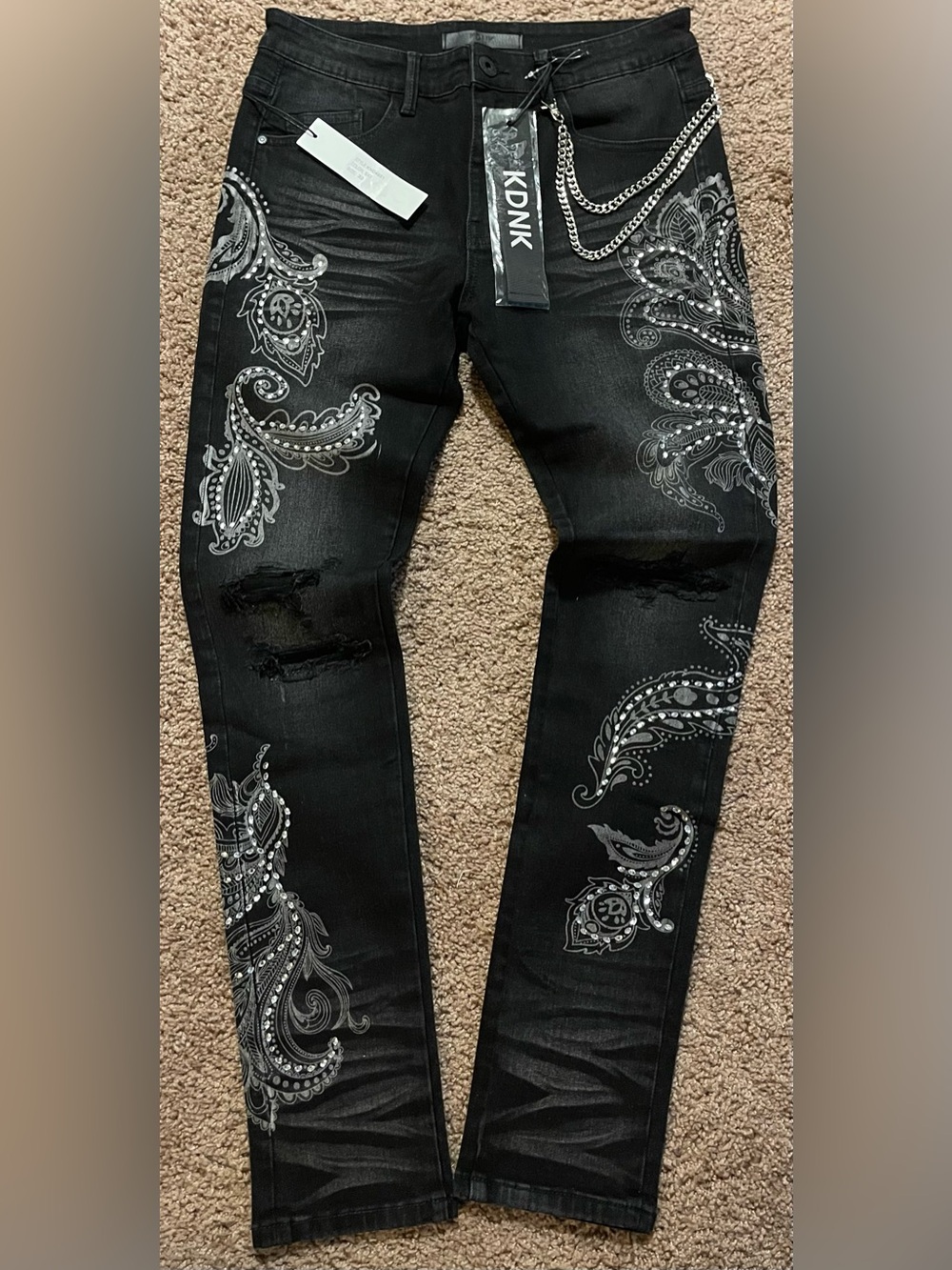 KDNK Black Skinny Jeans with Paisley Print and Chain.